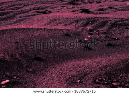 Red-blue colored shaded sands of the desert. Background and texture for modern design