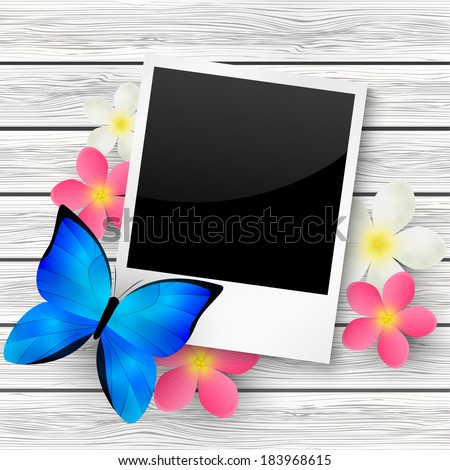 Photo card on wooden background