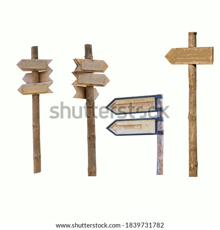 Set of wooden direction signs. Free space for writing text. Pointers on an isolated background. Natural pointers do not spoil the view.