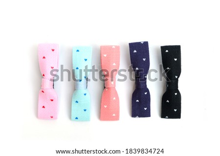 Hair Clips on White Background. Royalty-Free Stock Photo #1839834724