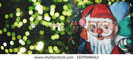 handmade Santa sculpture decorate Christmas tree form foam beat and colouring on night party with banner size
