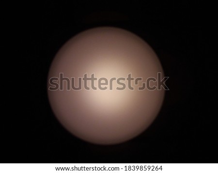lamp in the form of a white sphere