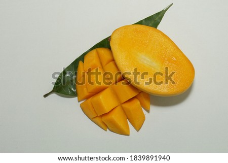 chopped mango isolated on white background