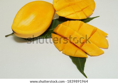 chopped mango isolated on white background