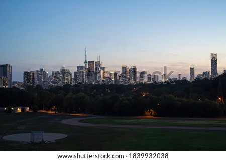Night view of Toronto City Skyline from Riverdale Park in Ontario Canada