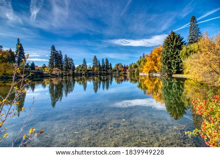 Fall view of Mirror Pond near Drake Park in Bend, Oregon Royalty-Free Stock Photo #1839949228