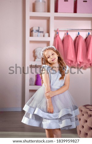 girl in a fluffy dress and a diadem