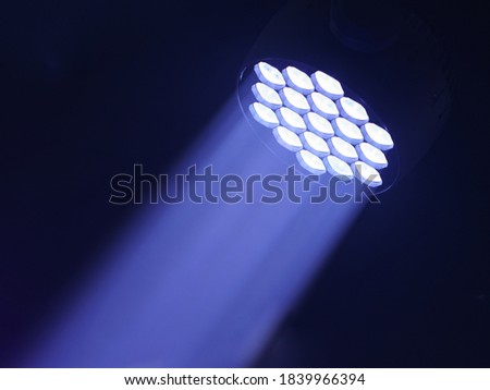 Futuristic bright lights on the stage. Lighting of stage spotlight. Natural high tech background. 