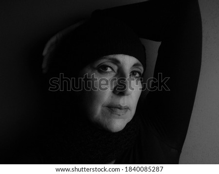 white woman in studio photo with soft lighting