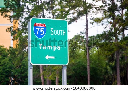 Tampa, USA road street interstate highway green arrow sign for i75 south to Tampa Florida with text closeup