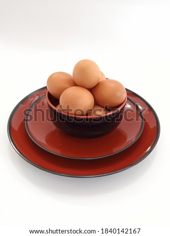 The picture of chicken egg on a table with high key or bright mood photography. The picture is taken in Jakarta-Indonesia, on Sunday, 25 of October 2020. 