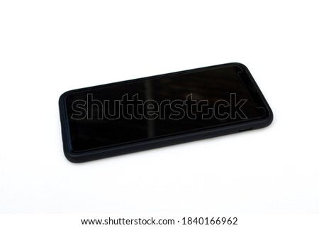 Black smartphone and case on white background.