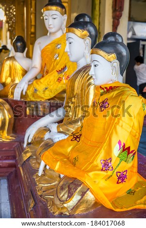 Statues of deities in the Buddhist temple. Shwedagon Pagoda was built in the 11th century