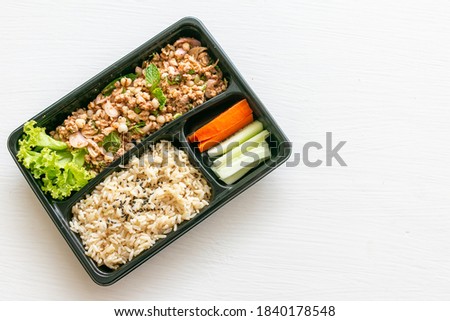 Catering food with healthy balanced diet delicious lunch box boxed take away deliver packed ready meal in black container dinner, meal, brakfast