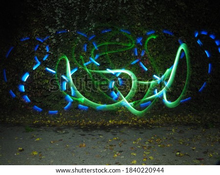 nice outdoor light paintig in green and blue