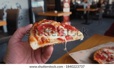 Sausage pizza served on the table