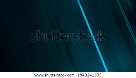 Light effect, blurred background. Wet asphalt, night view of the city, neon reflections on the concrete floor. Night empty stage, studio. Dark abstract background, dark empty street. Night city after 