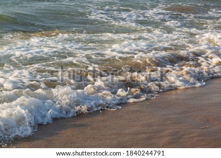 Wave of sea on sandy beach