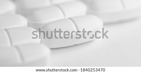 Macro photography of many Oval white tablet that can be divided