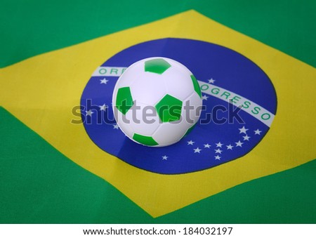 soccer ball with Brazil flag background