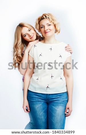 mother with teen daughter together posing happy smiling isolated on white background with copyspace, lifestyle people concept