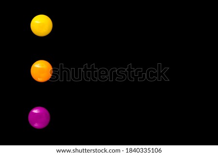 Magnetic paper clips isolated on black background