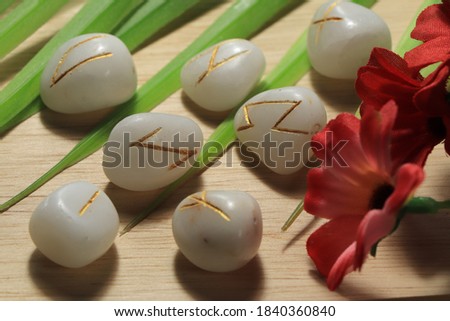 The runes are made of white stones. Used in magical rituals This picture is for a magical article.