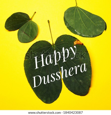 Happy Dussehra Text on sona patta
with yellow colour background 