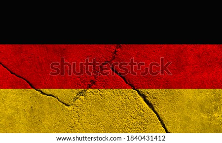 Faded Germany national flag pattern on broken cracked concrete wall, German political conflict concept texture background wallpaper