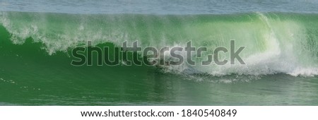 Surfer in a big wave, Anglet in the pays basque, France