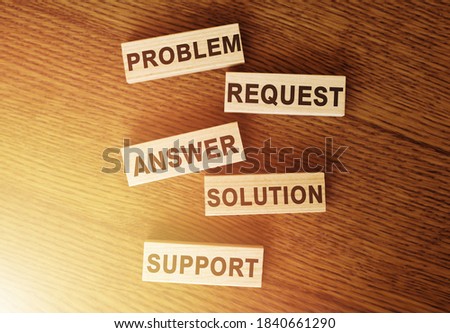Service concept on wooden blocks: problem, request, answer, solution, support