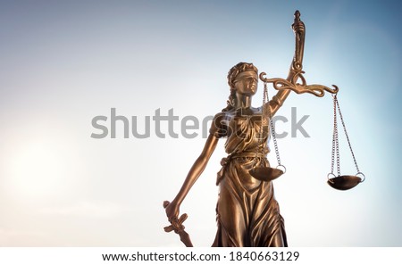 Legal and law concept statue of Lady Justice with scales of justice and sky background Royalty-Free Stock Photo #1840663129