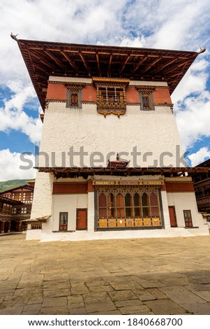 Bhutan, Paro, Rinpung Dzong. Bhutanese architecture around 15th century Buddhist monastery and fortress, Government Building Royalty-Free Stock Photo #1840668700