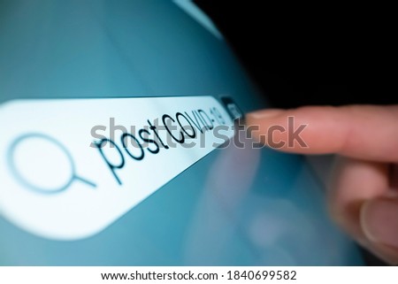Searching information on post COVID 19 era, shot with macro probe lens Royalty-Free Stock Photo #1840699582