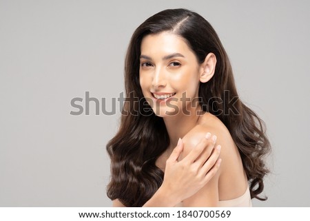 Beauty Glamour indian woman touch shoulder smile with clean and fresh skin Happiness and cheerful with positive emotional,isolate on grey background,Beauty Cosmetic and spa Facial treatment Concept Royalty-Free Stock Photo #1840700569