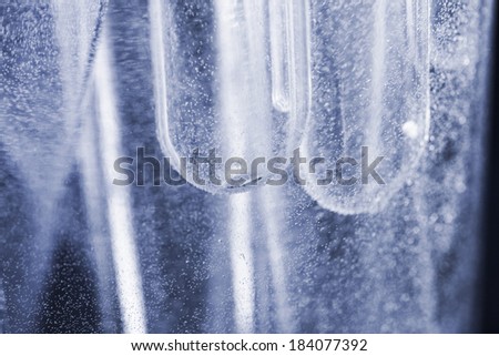 Abstract underwater composition with bubbles, tubes, lines and light 