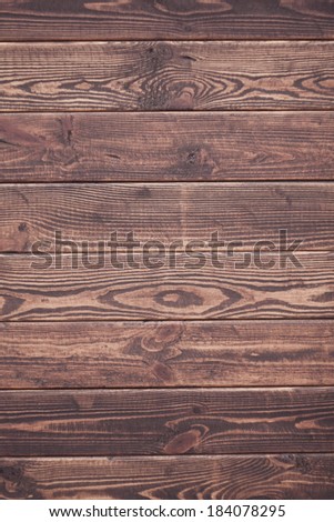 Wooden background. Brown grunge texture of wood board