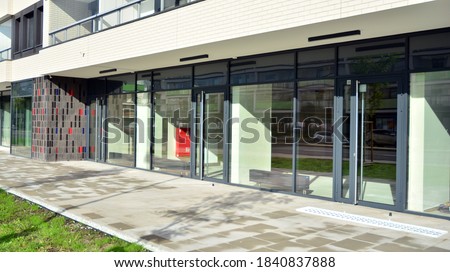 Panoramic windows of new commercial premises. Commercial property in development standard for rent.