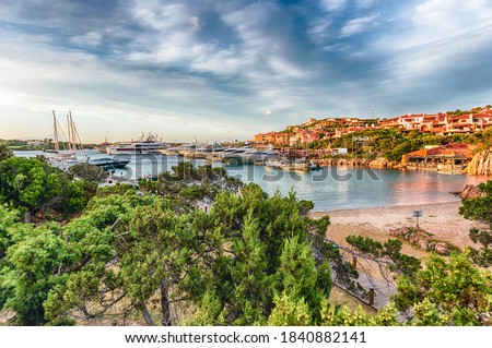 View of the harbor with luxury yachts of Porto Cervo, Sardinia, Italy. The town is a worldwide famous resort and a luxury yacht magnet and billionaires' playground Royalty-Free Stock Photo #1840882141