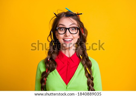 Photo of positive girl with pencil haircut amazed look in camera isolated shine color background