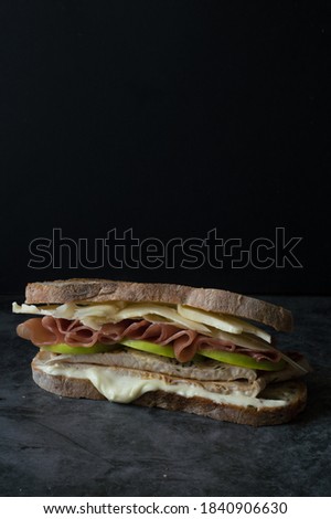 Sandwich with apple, cheese and italian ham 