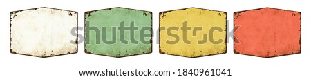 Four empty vintage tin signs on a white background