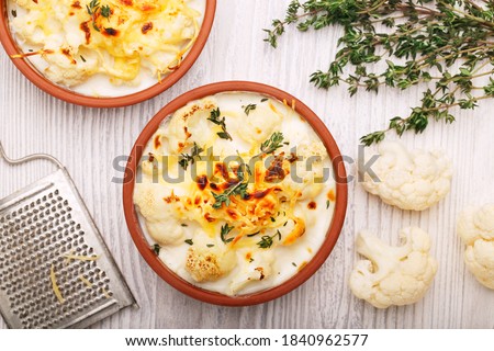 Cauliflower casserole with sauce cheese, top view Royalty-Free Stock Photo #1840962577