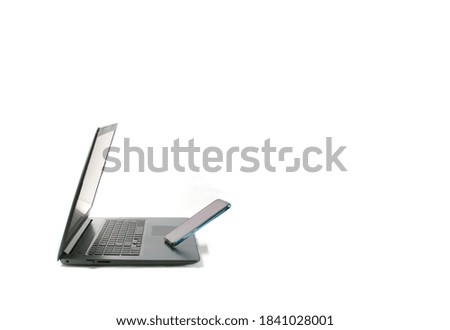 mobile phone and laptop black on white background