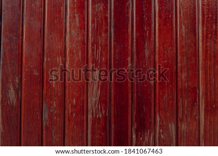  The texture of the boards. Background, red