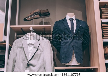 A set of jacket with a shirt in a boutique