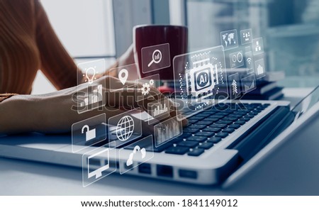 Hands of businesswoman working with laptop  and network connection on virtual screen at office table, Digital marketing and business concept, Background blurred. Royalty-Free Stock Photo #1841149012