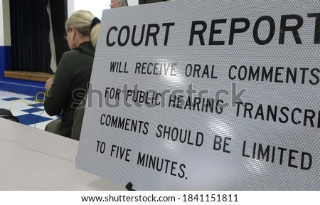 Court reporter at public hearing Royalty-Free Stock Photo #1841151811