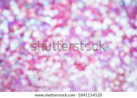 Atmospheric abstract colorful background, city lights at night blur. Background with bokeh defocused lights and shadow