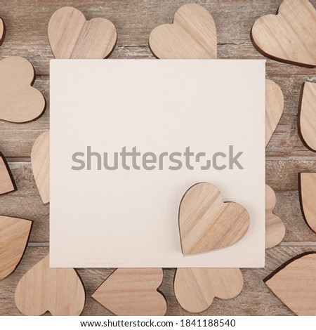 Wooden hearts symbols of love text frame background